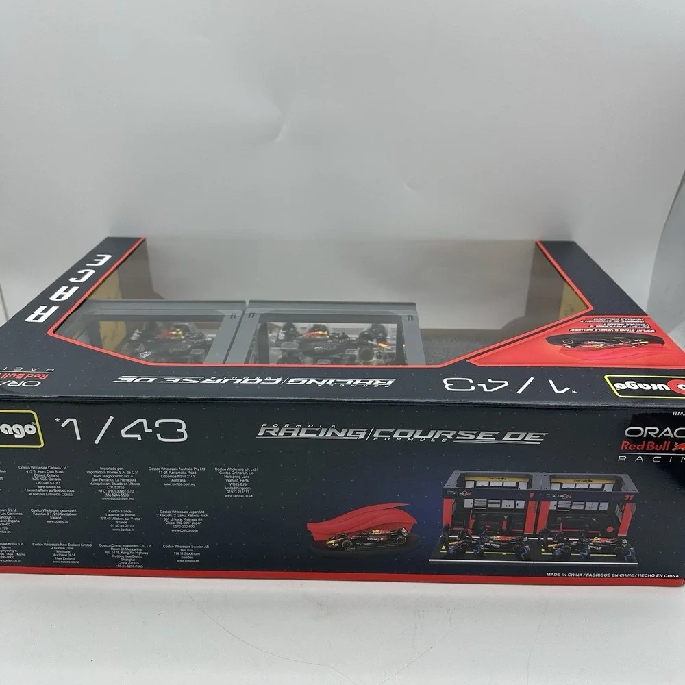 Burago 1:43 Formula 1 Deluxe Paddock Set Pit Crew Figures & Garage SP 11 Driver